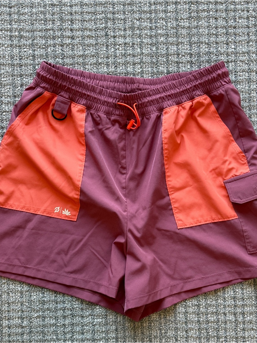 Peloton Maroon Shorts with Orange Pockets